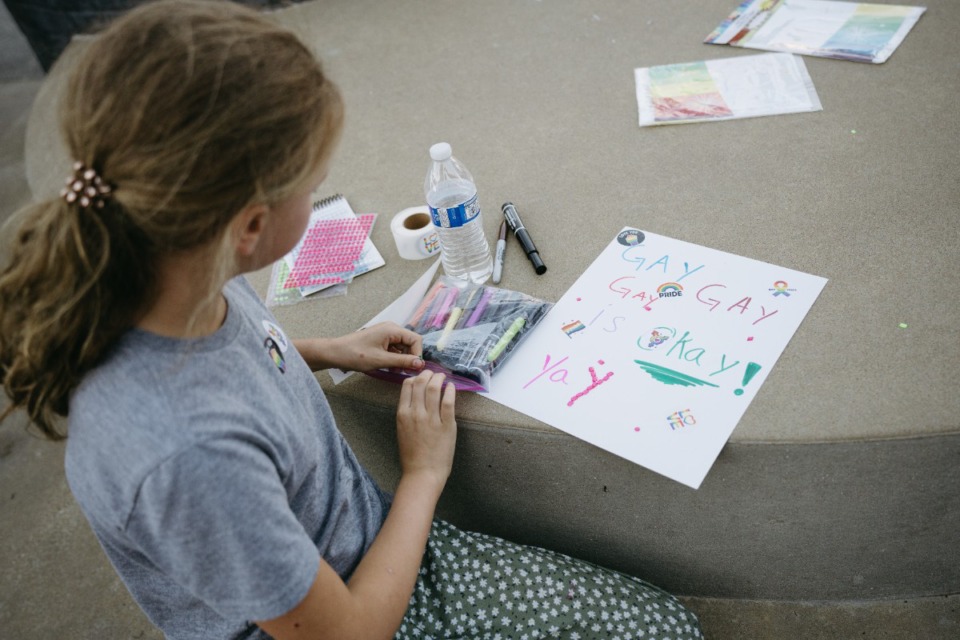 <strong>Jane Joyce-Munoz, age 8, makes a sign for the LGBTQ rights march on Sept. 30.</strong> (Lucy Garrett/Special to The Daily Memphian)