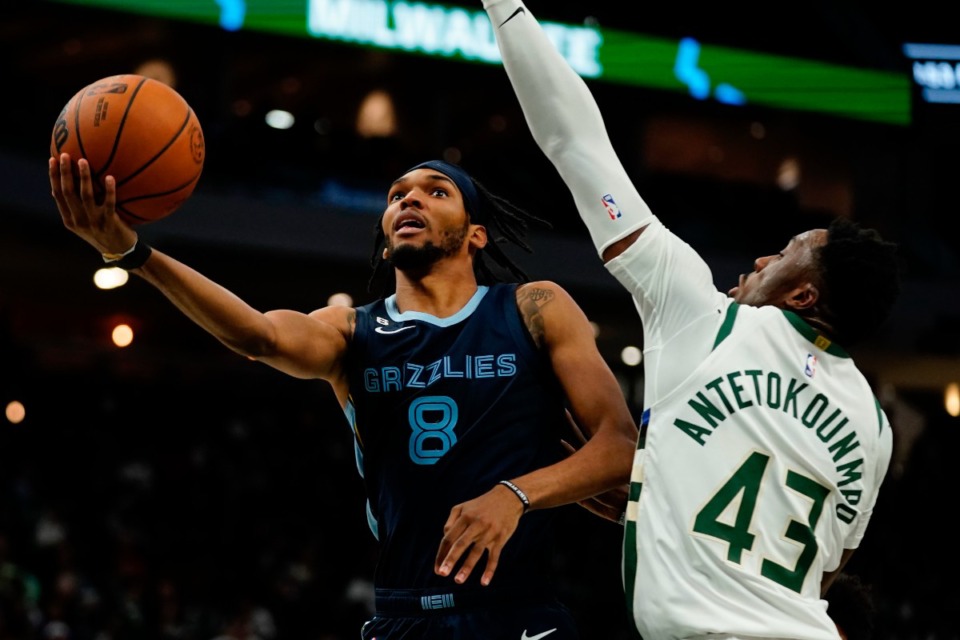 <strong>Memphis Grizzlies' Ziaire Williams shoots past Milwaukee Bucks' Thanasis Antetokounmpo during the second half of an NBA preseason basketball game Saturday, Oct. 1, 2022, in Milwaukee.</strong> (Morry Gash/AP)