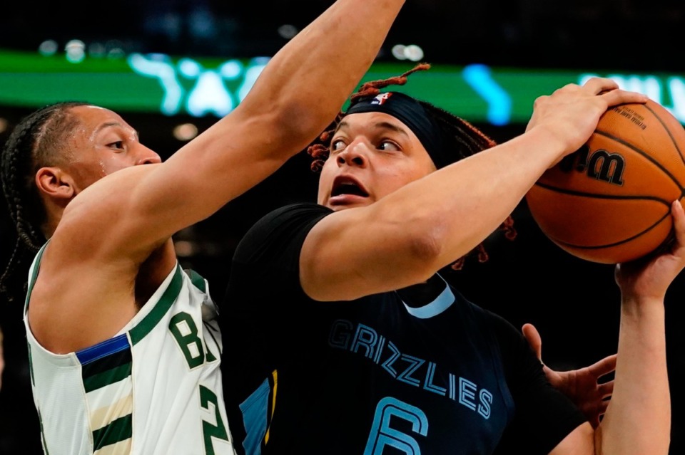 <strong>Memphis Grizzlies' Kenny Lofton Jr. tries to get past Milwaukee Bucks' Lindell Wigginton during the second half of an NBA preseason basketball game Saturday, Oct. 1, 2022, in Milwaukee.</strong> (Morry Gash/AP)