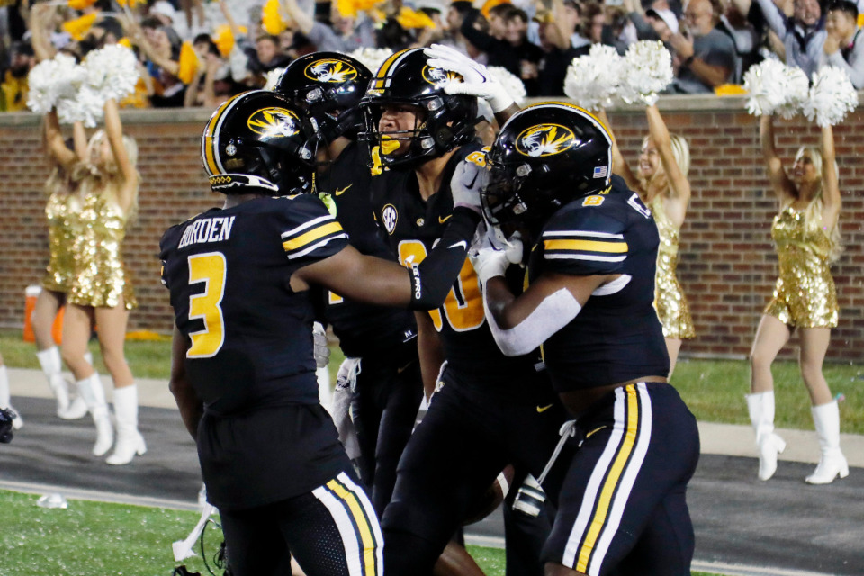 <strong>Missouri tight end Tyler Stephens, center, celebrates with his teammates after catching a pass for a touchdown during the second quarter of an NCAA football game against Georgia on Saturday, Oct. 1, 2022 in Columbia, Mo.</strong> (Colin E. Braley/AP)