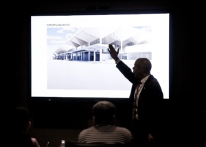 <strong>Memphis International Airport Vice President of Operations Terry Blue shows a rendering of what would be the outside of renovated terminal during a tour on Thursday, Aug. 25, 2022.</strong> (Mark Weber/The Daily Memphian file)