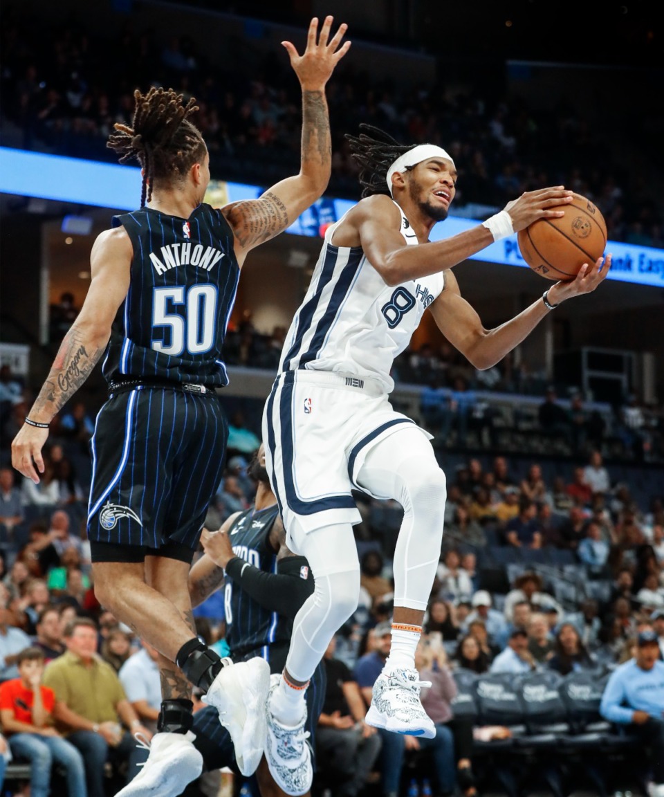 <strong>Memphis Grizzlies forward Ziaire Williams (right) drives the lane against Orlando Magic defender Cole Anthony (left) on Monday, Oct. 3, 2022.</strong> (Mark Weber/The Daily Memphian)