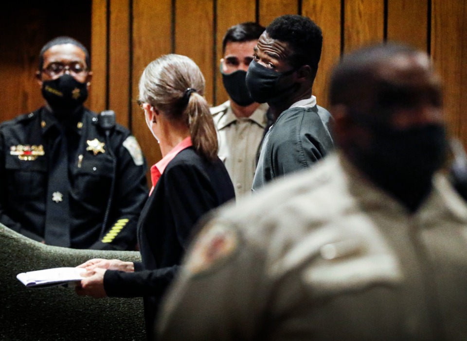 <strong>Defendant Cleotha Henderson (middle) appears in Judge Louis Montesi&rsquo;s courtroom for his arraignment on Tuesday, Sept. 6, 2022. A preliminary hearing has been set for Henderson who is charged with first-degree murder, especially aggravated kidnapping and tampering with evidence in connection with the death of jogger Eliza Fletcher.</strong> (Mark Weber/The Daily Memphian file)