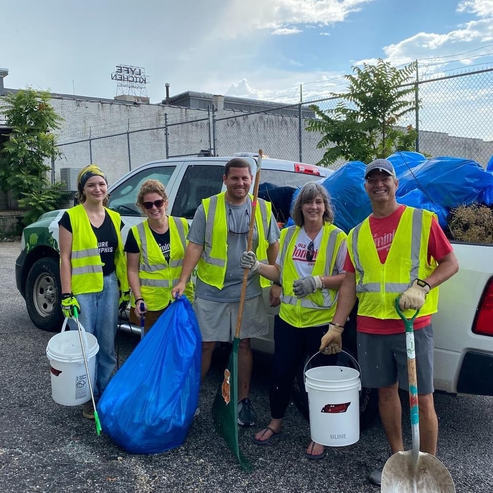<strong>Old Dominick employees participate in a Downtown cleanup in August using the Litterati app.</strong> (Courtesy Clean Memphis)