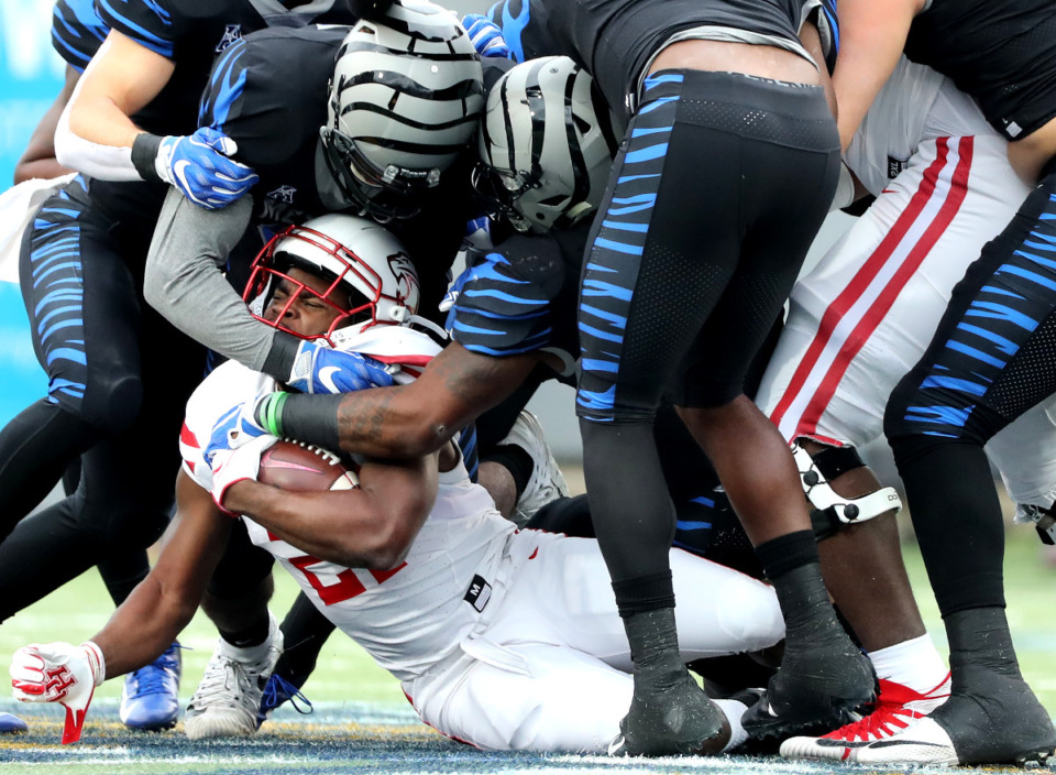 <strong>Houston comes to town Friday night to play the Memphis Tigers, but should college football be played on a night usually reserved for high school football?</strong> (Houston Cofield/Daily Memphian file)