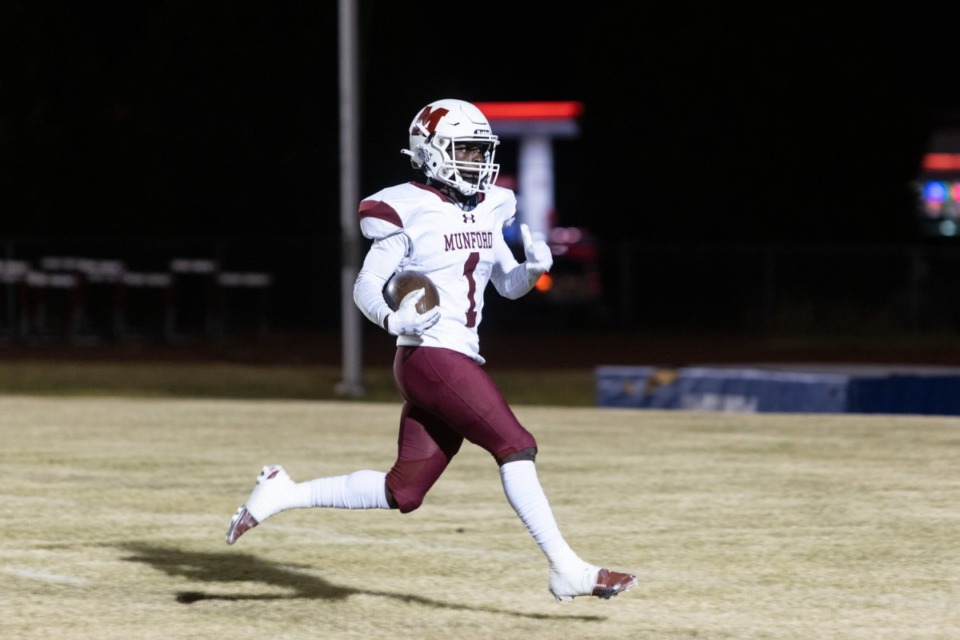 <strong>Munford&rsquo;s Braxton Sharp runs for a touchdown during Friday night&rsquo;s game at Southwind High School.</strong> (Brad Vest/Special to The Daily Memphian)
