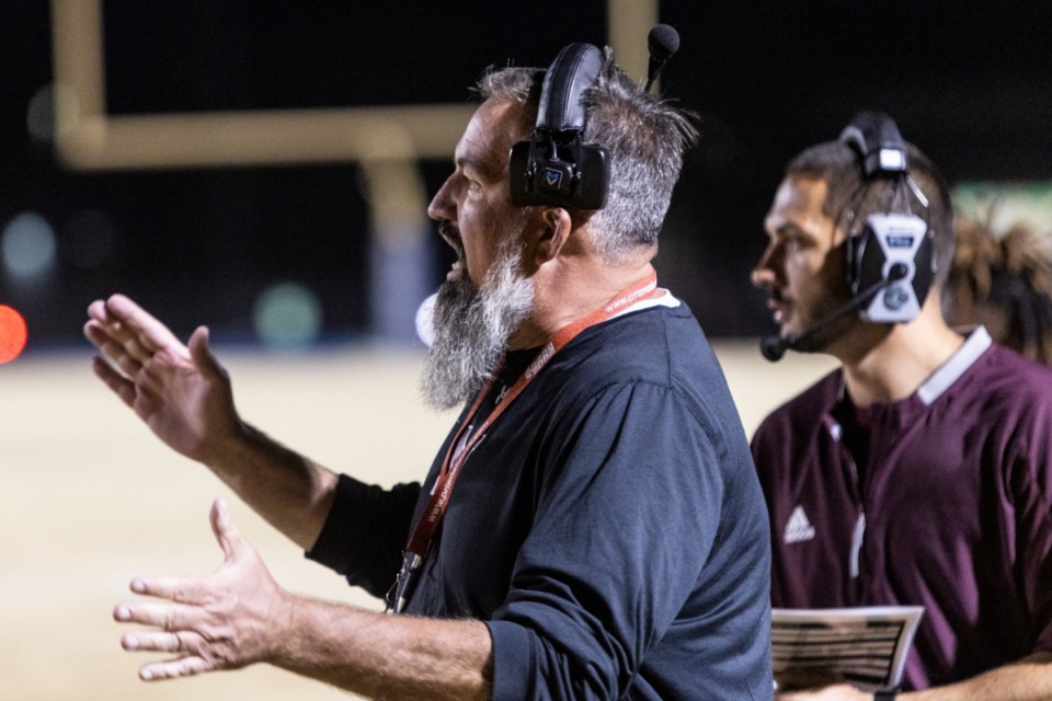 <strong>Munford head coach Slad Calhoun directs his team during Friday night&rsquo;s game against Southwind.&nbsp;</strong>(Brad Vest/Special to The Daily Memphian)