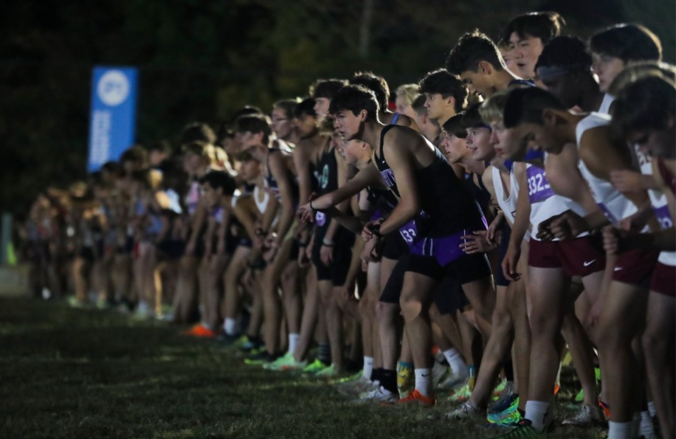 <strong>Varsity boys line up for the start of the Frank Horton Night Classic at Shelby Farms, Saturday, Oct. 8, 2022. CBHS won the varsity boys title. Houston High and Arlington High also placed in the top 5.</strong> (Patrick Lantrip/The Daily Memphian)