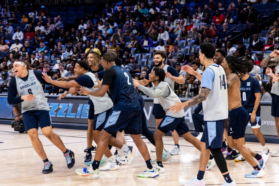 <strong>Kenneth Lofton Jr. (left) is encouraged to dance during the Grizzlies&rsquo; annual open practice Sunday at FedExForum.</strong> (Brad Vest/Special to The Daily Memphian)