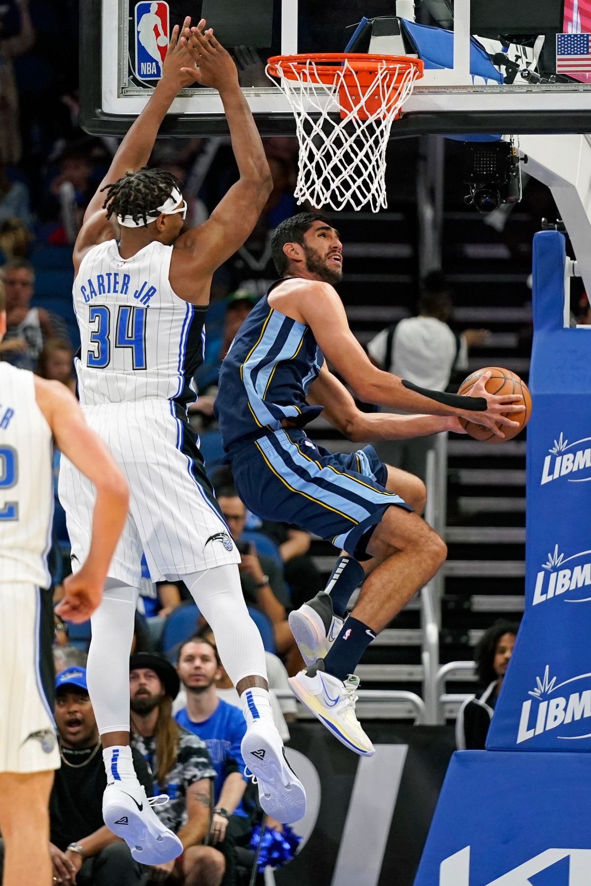 <strong>Memphis Grizzlies' Santi Aldama, right, looks for a shot as he gets past Orlando Magic's Wendell Carter Jr. (34) on Oct. 11, 2022, in Orlando, Florida.</strong> (John Raoux/AP)