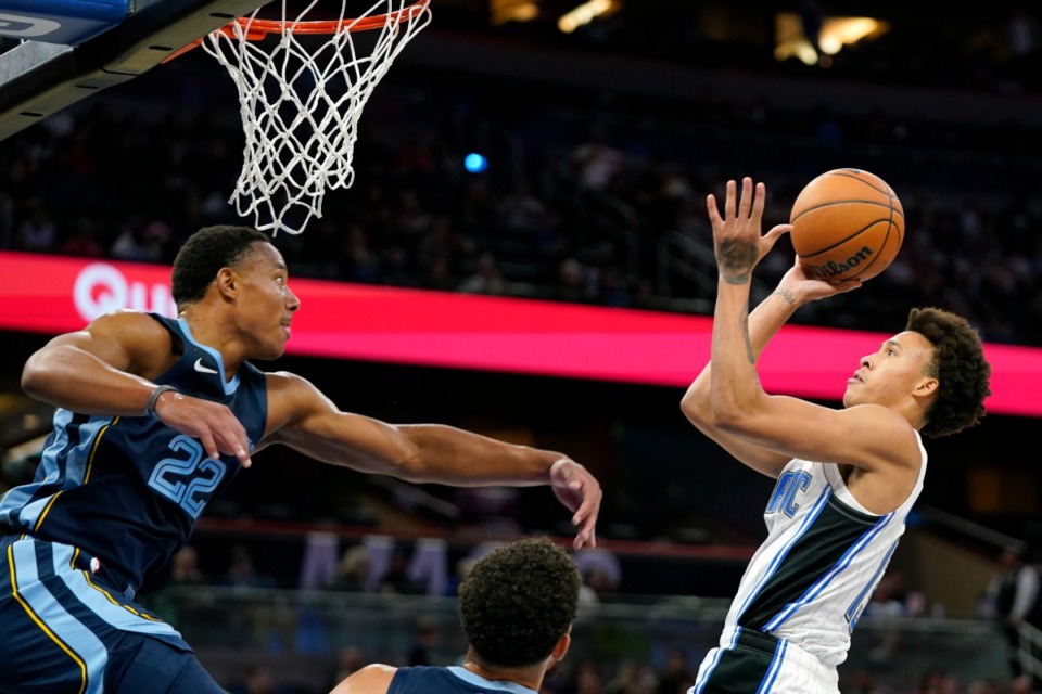 <strong>Memphis Grizzlies' Desmond Bane (22) tries to stop Orlando Magic's R.J. Hampton, right, from taking a shot&nbsp;on Oct. 11, 2022, in Orlando, Florida.</strong> (John Raoux/AP)