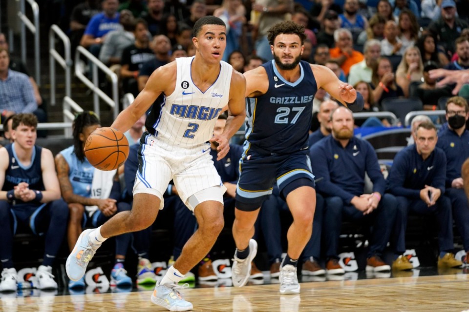 <strong>Orlando Magic's Caleb Houstan (2) moves to the basket past Memphis Grizzlies' David Roddy (27)&nbsp;on Oct. 11, 2022, in Orlando, Florida.&nbsp;</strong>(John Raoux/AP)