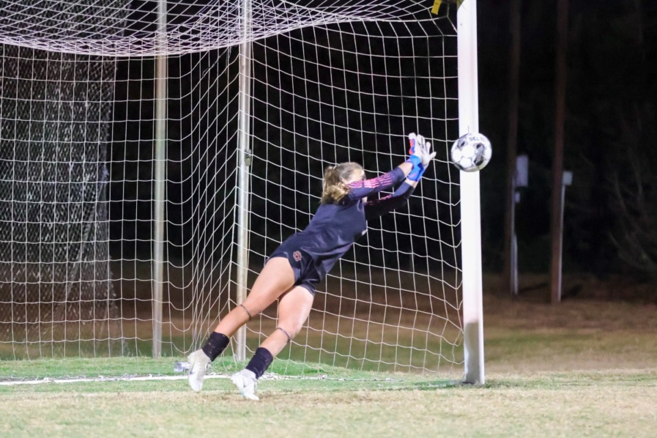 <strong>St. George&rsquo;s Riley Stooksbury (1) makes the game-winning save in the West Region semifinal game against ECS on Oct. 11, 2022, against ECS.</strong> (Ryan Beatty/Special to The Daily Memphian)