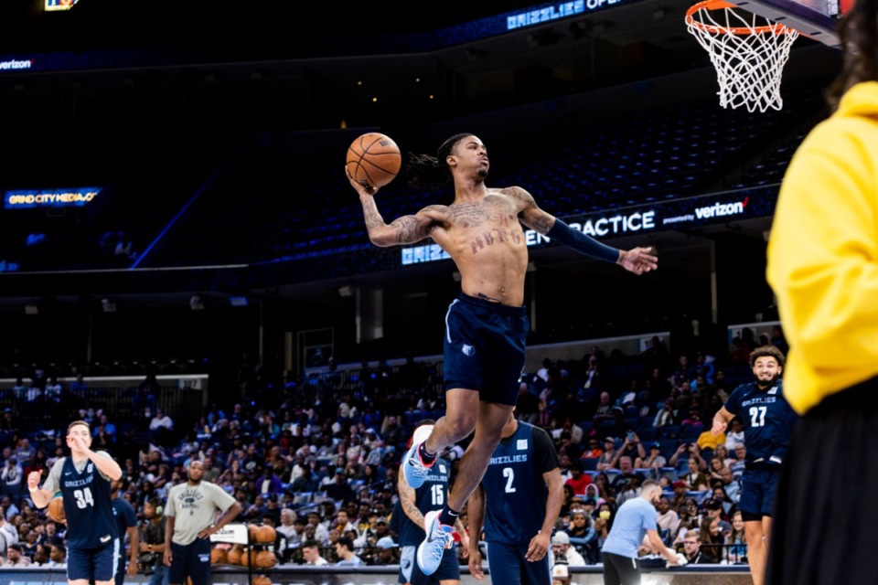 <strong>Ja Morant dunks during the Grizzlies&rsquo; annual open practice Sunday at FedExForum.</strong> (Brad Vest/Special to The Daily Memphian)