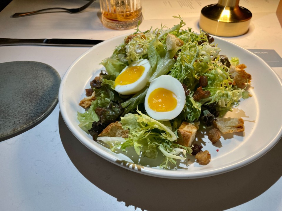 <strong>You&rsquo;ll find the dressing at the bottom of this large Lyonnaise salad.</strong> (Jennifer Biggs/The Daily Memphian)