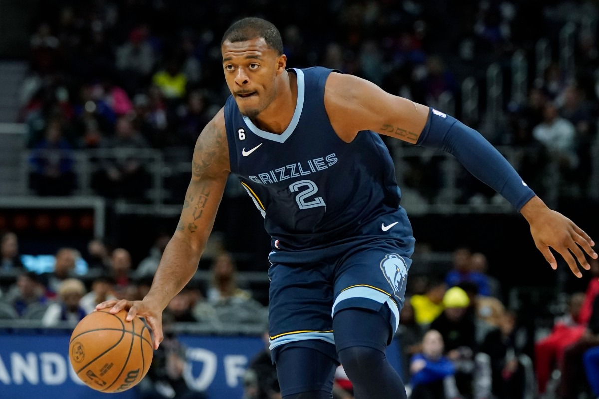 <strong>Memphis Grizzlies center Xavier Tillman Sr. controls the ball during the second half of an NBA preseason basketball game against the Detroit Pistons on Thursday, Oct. 13, 2022, in Detroit.</strong> (Carlos Osorio/AP)