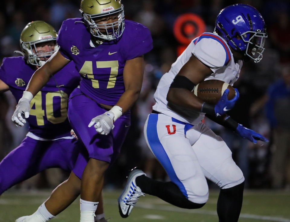 <strong>MUS running back Tee Perry (9) scrambles for a first down on Oct. 14, 2022, in the game against CBHS.</strong> (Patrick Lantrip/Daily Memphian)