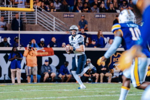 <span class="custom-value ng-binding ng-scope"><strong>Memphis quarterback Seth Henigan rolls out during the Tigers game at East Carolina, Saturday, Oct. 15, 2022.</strong> (Courtesy Memphis Athletics)&nbsp;</span>