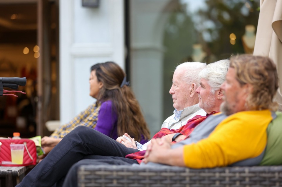 <strong>Onlookers relax and watch a Sunday Matinee Concert at the Shops of Saddle Creek on Oct. 16, 2022.</strong> (Ryan Beatty/Special to The Daily Memphian)