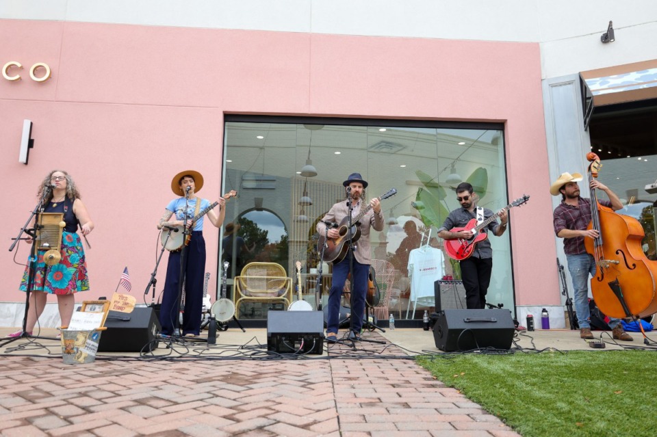 <strong>The Side Street Steppers, Katherine Whitfield (left), Vera Victoria, Christian Stanfield, Donald Miller III and Ben Walsh, perform in front of Nail Bar at Saddle Creek North.&nbsp;</strong>(Ryan Beatty/Special to The Daily Memphian)