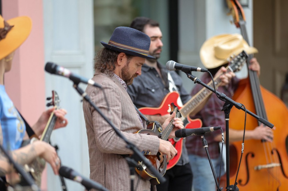 <strong>Christian Stanfield (blue hat) leads as the Side Street Steppers perform a Sunday Matinee Concert at the Shops of Saddle Creek on Oct. 16, 2022.</strong> (Ryan Beatty/Special to The Daily Memphian)