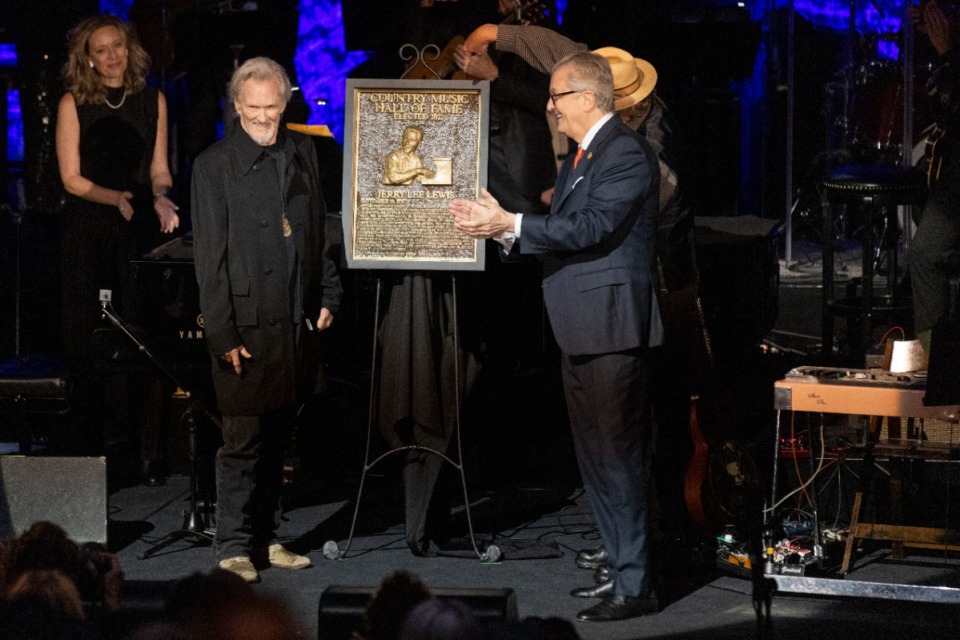 <strong>Kris Kristofferson (left), stands with the plaque of honoree Jerry Lee Lewis during the Country Music Hall of Fame Medallion Ceremony on Sunday, Oct. 16, 2022, at the Country Music Hall of Fame in Nashville.</strong> (Wade Payne/Invision/AP)