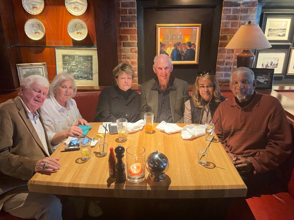 <strong>Derek Hunter (right) and his wife Paula (second from right) visits with Jack Waters (Hunter&rsquo;s coach at Delta State, third from right) and his wife Cindy (fourth from right) and Ken Parks (Delta State assistant, left) and his wife Brenda (second from left).</strong> (Submitted)