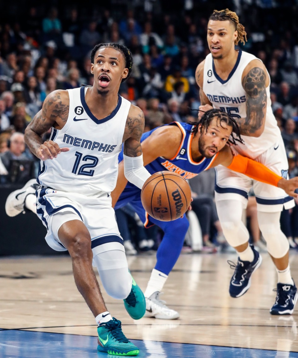 <strong>Memphis Grizzlies guard Ja Morant (left) drives the lane against the New York Knicks on Wednesday, Oct. 19, 2022.</strong> (Mark Weber/The Daily Memphian)