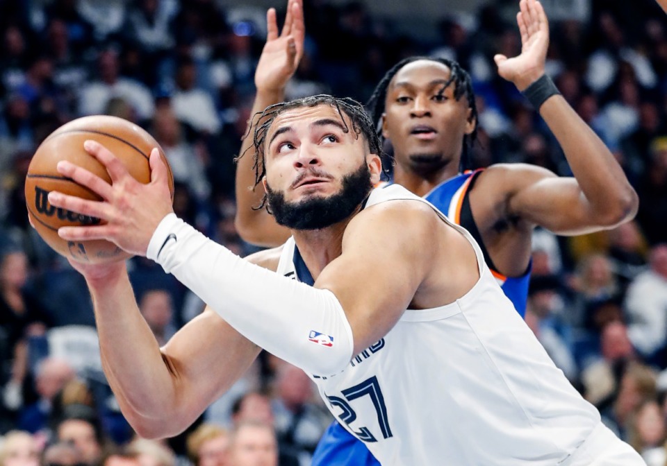 <strong>Memphis Grizzlies forward David Roddy (front) grabs a rebound against the New York Knicks on Wednesday, Oct. 19, 2022.</strong> (Mark Weber/The Daily Memphian)