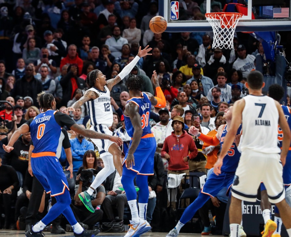 <strong>Memphis Grizzlies guard Ja Morant (middle) drives for a layup against the New York Knicks on Wednesday, Oct. 19, 2022.</strong> (Mark Weber/The Daily Memphian)