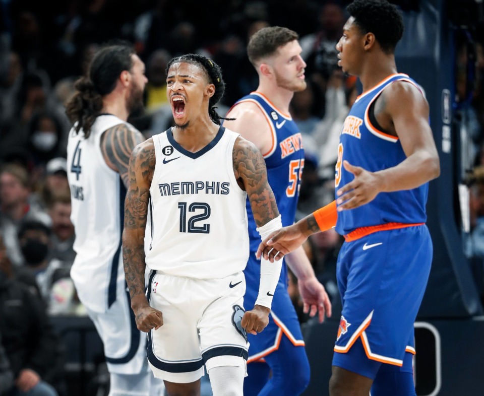 <strong>Memphis Grizzlies guard Ja Morant (left) celebrates a basket against the New York Knicks on Wednesday, Oct. 19, 2022.</strong> (Mark Weber/The Daily Memphian)