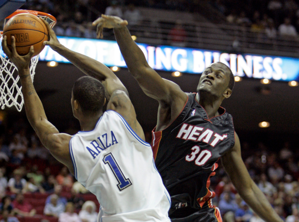 <strong>Earl Barron (30), a former standout basketball player at the University of Memphis, played for 14 years in the NBA and won a title with the Miami Heat in 2006. </strong>(AP Photo/John Raoux)