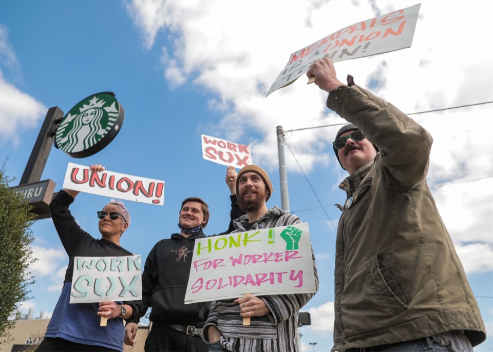 <strong>Wesley McGrew (center) and members of Restaurant Workers United joined a march supporting the unionization of the Poplar Avenue Starbucks in Memphis, Tennessee, on March 9, 2022.</strong> (Patrick Lantrip/The Daily Memphian file)