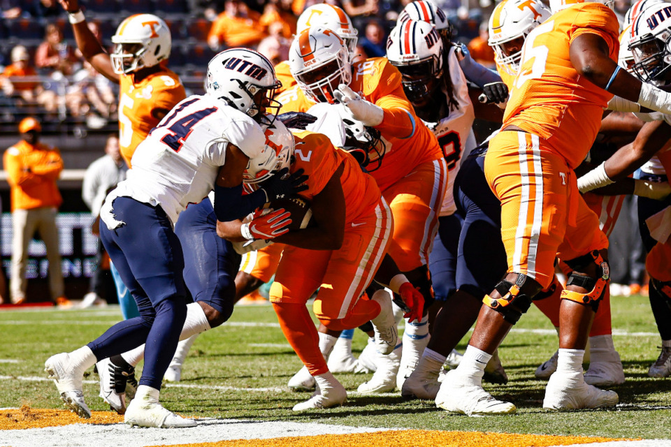 <strong>Tennessee running back Jabari Small (2), from Briarcrest Christian School, crosses the goal line for a touchdown as he's hit by Tennessee Martin defensive back Tyler Gore (14) during the first half of an NCAA college football game Saturday, Oct. 22, 2022, in Knoxville, Tenn.</strong> (AP Photo/Wade Payne)