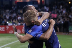 <strong>Memphis 901 FC midfielders Leston Paul (23) and Patrick Seagrist (7) hug after an Oct. 22, 2022 playoff win.</strong> (Patrick Lantrip/The Daily Memphian)