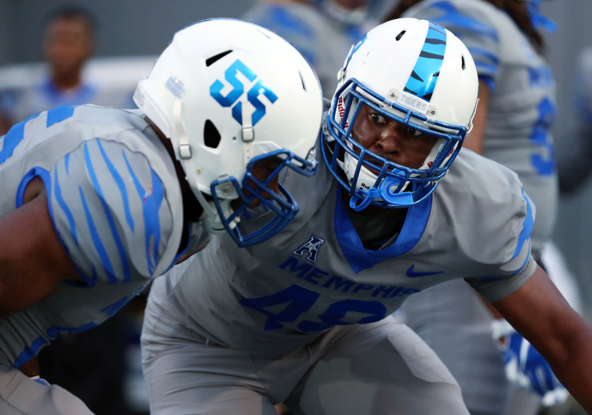 <strong>University of Memphis defensive lineman Wardalis Ducksworth (55) practices defensive drills prior to the annual Friday Night Stripes scrimmage game on April 12, 2019.</strong> (Houston Cofield/Daily Memphian)