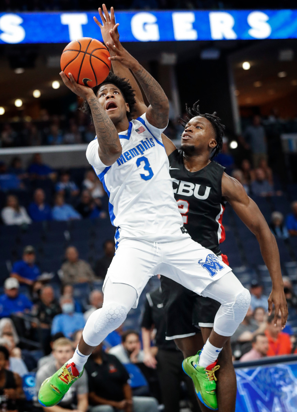 <strong>Memphis Tigers guard Kendric Davis (front) drives the lane against Christian Brothers University defender Nmeso Nnebedum (back) during action on Sunday, October 23, 2022.</strong> (Mark Weber/The Daily Memphian)