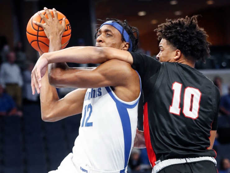 <strong>Memphis Tigers forward DeAndre Williams (left) is fouled by Christian Brothers University defender Madison Monroe (right) during action on Sunday, October 23, 2022.</strong> (Mark Weber/The Daily Memphian)