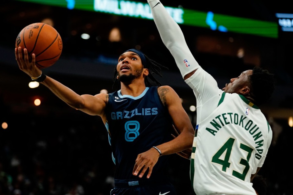 <strong>Memphis Grizzlies' Ziaire Williams shoots past Milwaukee Bucks' Thanasis Antetokounmpo during the second half of an NBA preseason basketball game Saturday, Oct. 1, 2022, in Milwaukee.</strong> (AP Photo/Morry Gash)