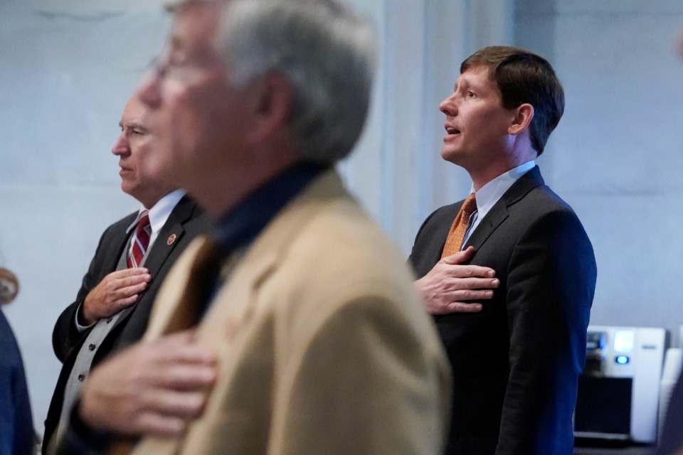 <strong>Sen. Brian Kelsey, right, R-Germantown, stands for the Pledge of Allegiance Wednesday, Oct. 27, 2021, in Nashville, Tenn. </strong>(AP Photo/Mark Humphrey)