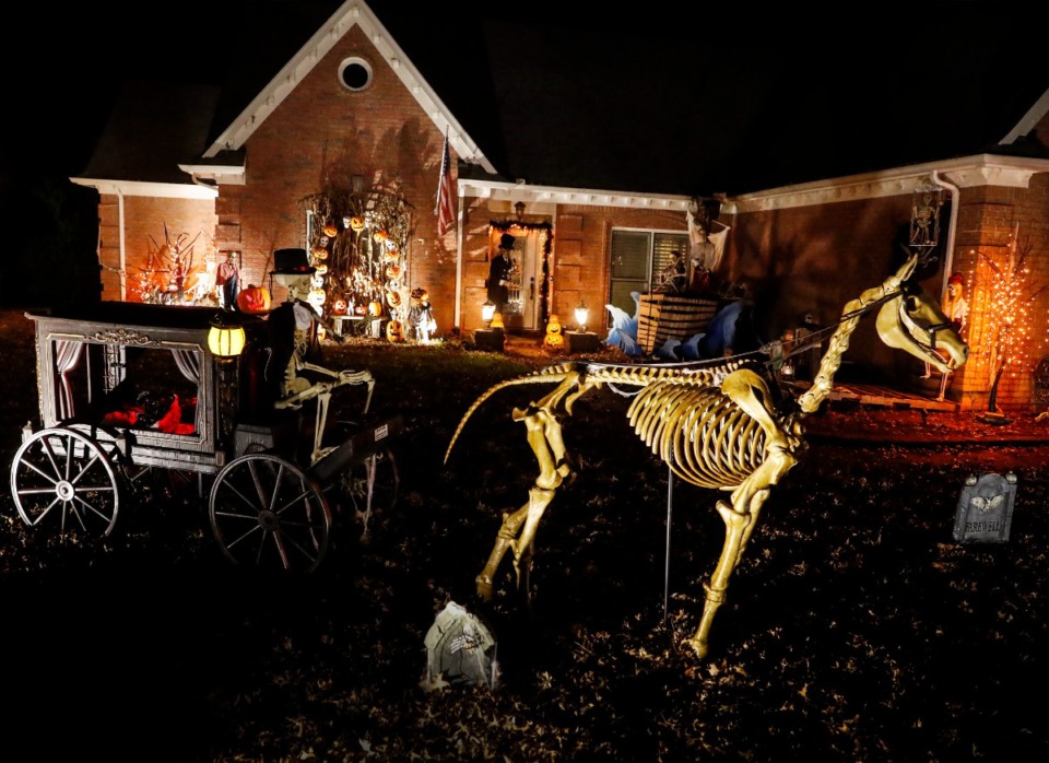<strong>Kelli Bastidas&rsquo; yard on Lake Page Drive in Collierville features an elaborate skeleton display.</strong> (Mark Weber/The Daily Memphian)