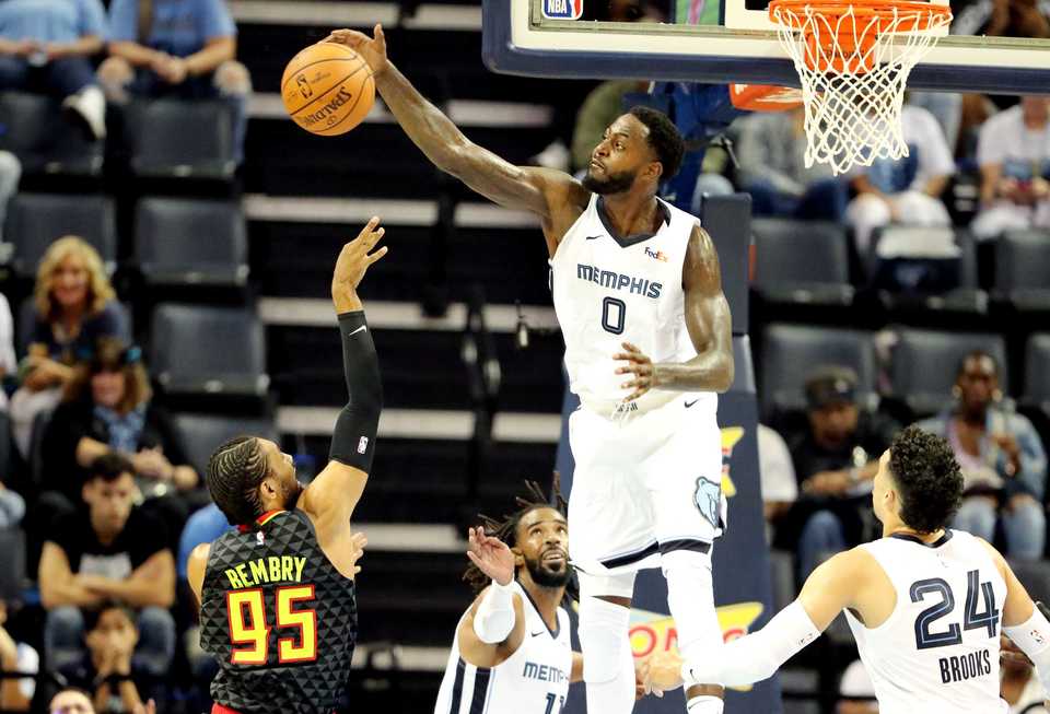 Grizzlies forward JaMychal Green blocks a shot by by Atlanta Hawks' DeAndre Bembry. The Grizzlies beat the Hawks 110-120 in the first pre-season game of the year. (Houston Cofield/Daily Memphian)