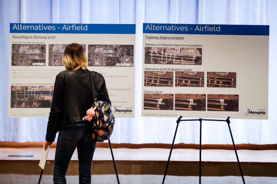 <strong>An attendee looks over exhibits at the Memphis-Shelby County Airport Authority public information meeting. The master plan was last updated in 2018.</strong> (Mark Weber/The Daily Memphian)