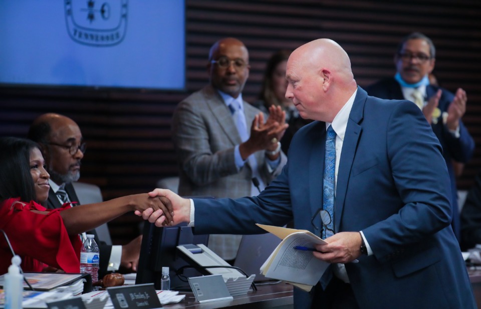 <strong>Doug McGowen shakes hands with Memphis City Council members after getting confirmed as the new CEO of MLGW Nov. 1, 2022.</strong> (Patrick Lantrip/Daily Memphian)