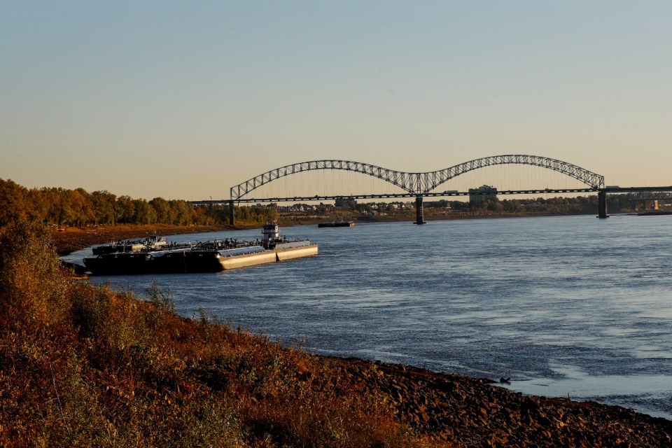 <strong>A river barge sits on the edge of the Mississippi River near Mud Island. Historically low water levels of the river have caused massive barge backups.</strong> (Mark Weber/The Daily Memphian)