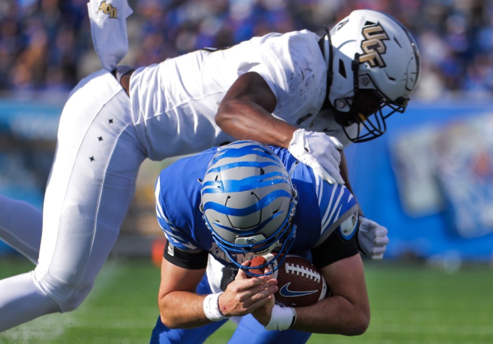 <strong>University of Memphis quarterback is taken down during the Nov. 5, 2022 game against UCF.</strong> (Patrick Lantrip/The Daily Memphian)