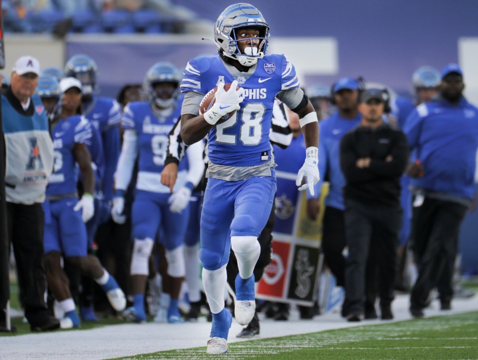 <strong>University of Memphis running back Asa Martin (28) runs down the sideline during a Nov. 5, 2022 game against UCF.</strong> (Patrick Lantrip/The Daily Memphian)