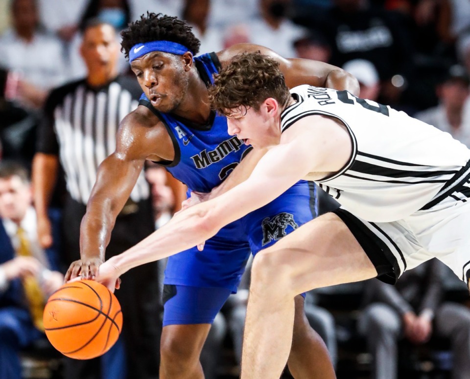 <strong>Memphis center Malcolm Dandridge (left), with 81 games under his belt, is one of the vets in the Tigers lineup.</strong> (Mark Weber/The Daily Memphian)