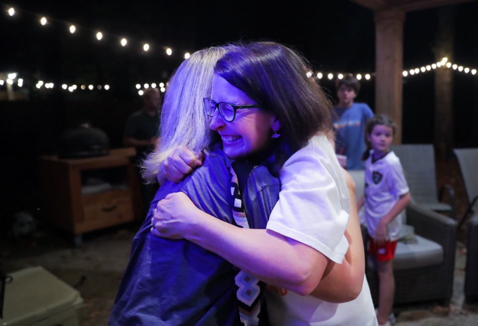 <strong>Angela Griffith hugs a friend at an election watch party held at her house on Nov. 8, 2022. Griffith won reelection to the Germantown Municipal School District Board of Education.</strong> (Patrick Lantrip/The Daily Memphian)