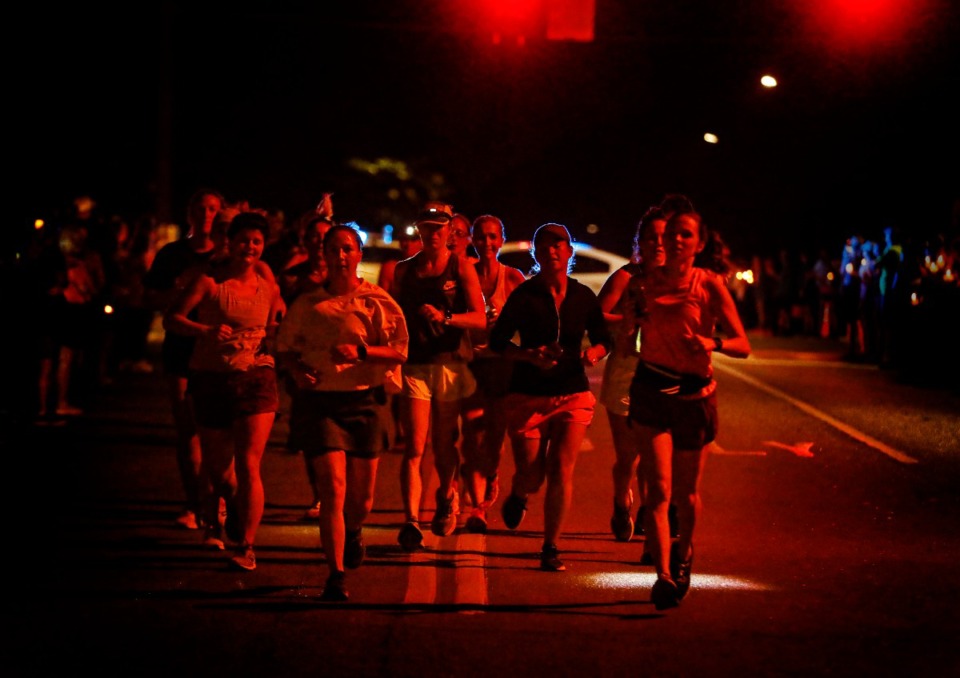 <strong>Runners, supporters and mourners attend the 4:30 a.m &ldquo;Let's Finish Liza's Run&rdquo; event on Friday, Sept. 9, 2022.</strong> (Mark Weber/The Daily Memphian file)